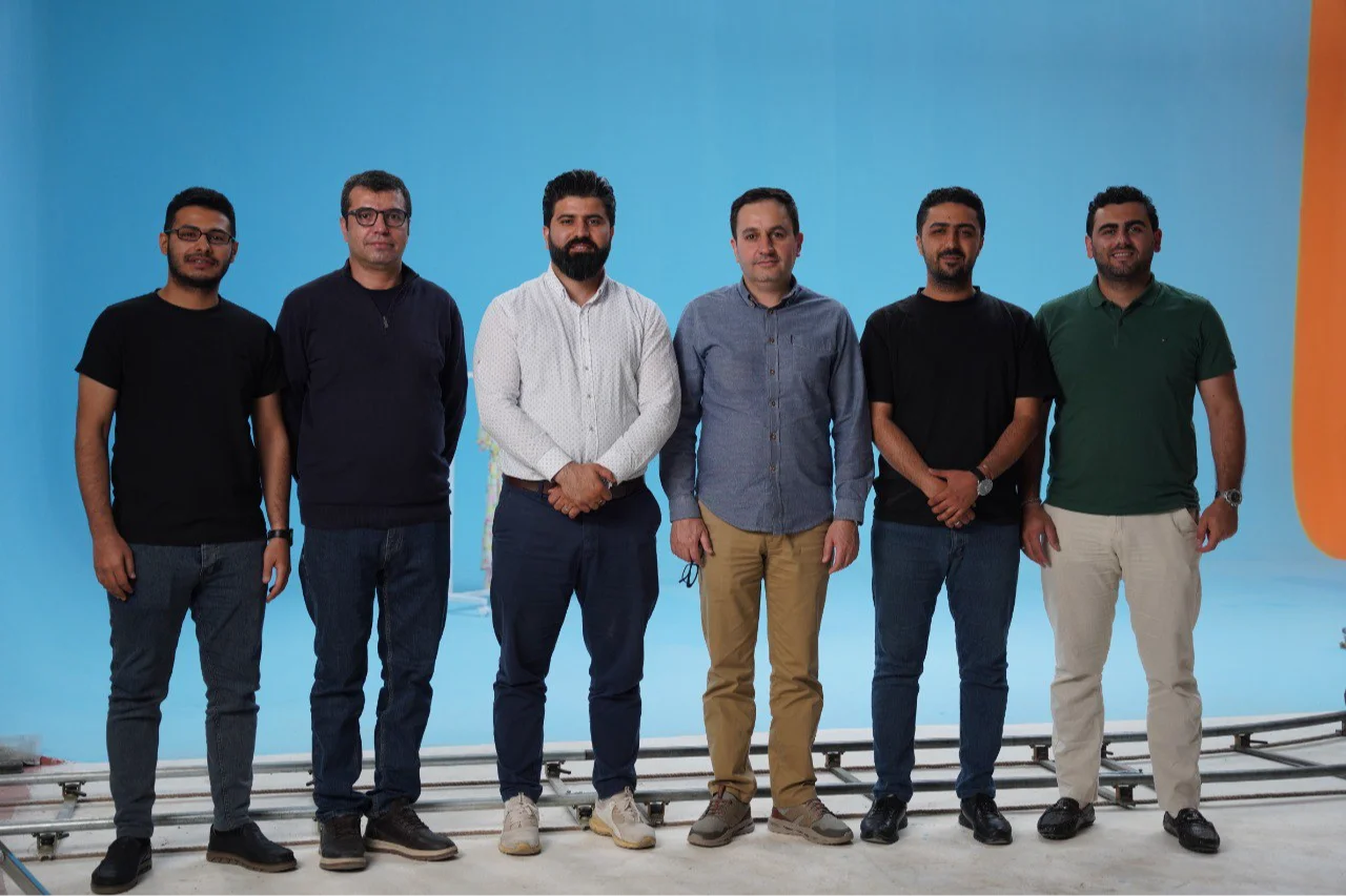 The Mithra Production team on a studio set